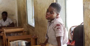 students asking questions in a classroom