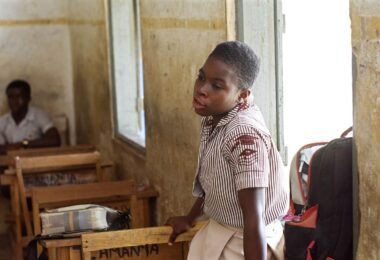 students asking questions in a classroom