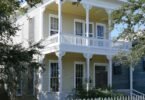 family viewing a new home with an agent