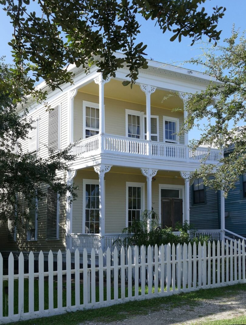 family viewing a new home with an agent