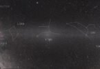 A comet streaking across a dark night sky