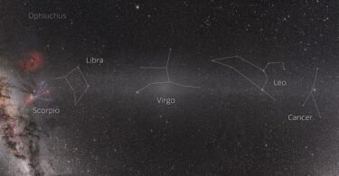 A comet streaking across a dark night sky