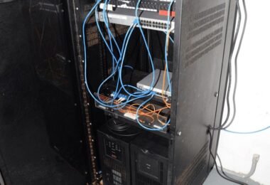 network cables in a blue-lit server room